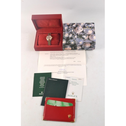 200A - Ladies ROLEX watch with Mother of pearl and diamond face (in original box). Has a valuation certific... 