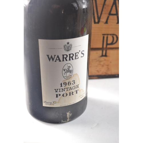 214B - WARRES wooden cased MAGNUM bottles of vintage 1963 port, some leakage in bottles, 
bottle 1 only 1.5... 