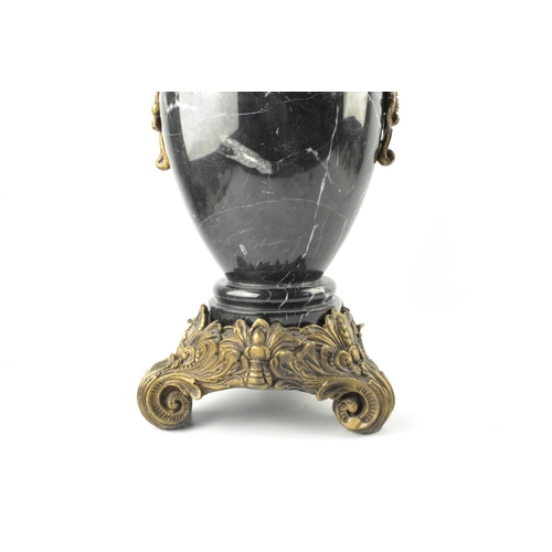 234 - Maitland-Smith Black marble vase with brass mounted twin handles and base of scrolling leaf form, 57... 