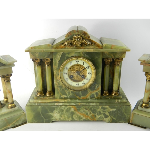 240 - Antique onyx mantle clock with oynx garniture set. 
Condition: Missing pendulum and key, cracked gla... 