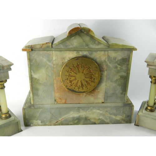 240 - Antique onyx mantle clock with oynx garniture set. 
Condition: Missing pendulum and key, cracked gla... 