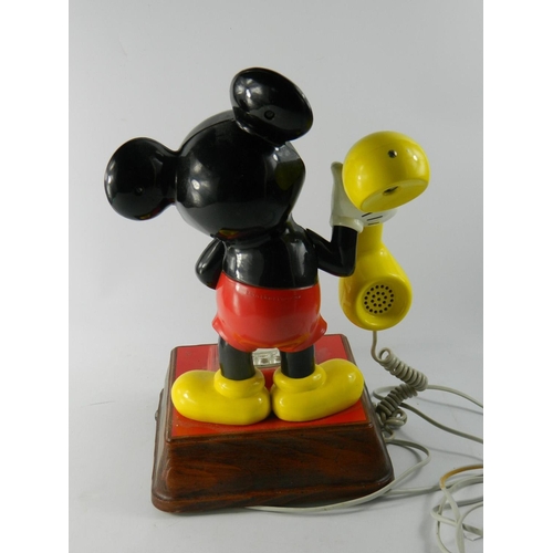 26 - 1970's 'Micky Mouse'  plastic telephone, with finger turning dial, [38 cm high] Working, good condit... 