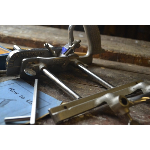 262 - A 'RECORD' improved combination plane with spare blades and a boxed cutter clamping bracket