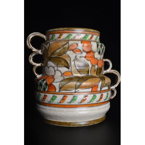 27 - CHARLOTE RHEAD twin handled pottery vase, with stylised flower and leaf design. [H: 14cm approx] goo... 