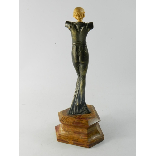 32 - Art Deco style female figure with carved ivorine head on bronzed body and marble base. [H:34cm appro... 