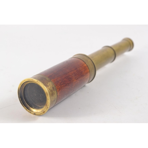 37A - Small late 19th century telescope with mahogany and brass casing with a case. Extended length: 29cm