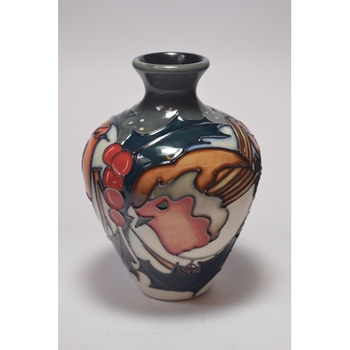 65 - Moorcroft pottery baluster vase having robin and holly design by Kerry Goodwin, approx 10cm high