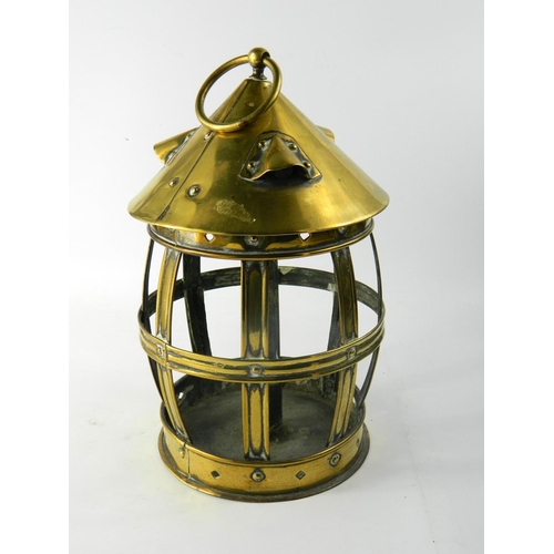 80 - Unusual circa 1900s brass cage lantern with hoop handle to top, an open frame with candle stand to c... 