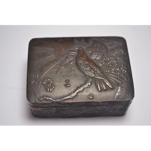 83 - Japanese bronzed pin box having moulded birds on a branch with the rising sun decoration.
Condition:... 