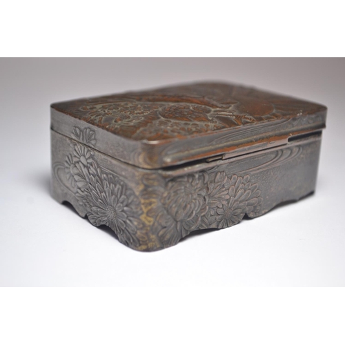 83 - Japanese bronzed pin box having moulded birds on a branch with the rising sun decoration.
Condition:... 