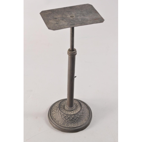 96 - Victorian brass stick letter scales having a sprung top on moulding base