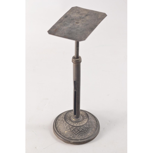 96 - Victorian brass stick letter scales having a sprung top on moulding base