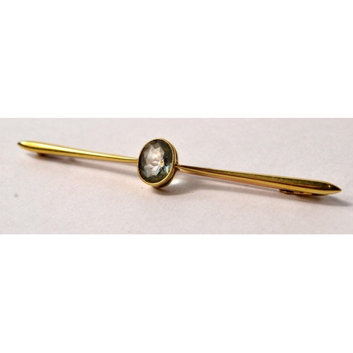 14 - 14ct bar brooch with oval pale blue stone 2.6g gross L: 6cm approx