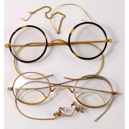 22 - Two pairs of stamped 10ct vintage spectacles and a nosebridge. Gross weight: 32g