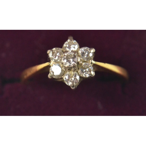 7A - Vintage 18ct gold ring with 7 diamond flower head design size P/N. Gross weight: 2.3g (with ring box... 