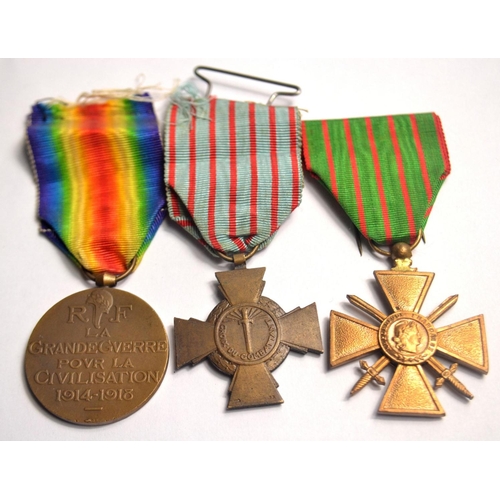 119B - Set of French medals to include WWI Victory medal, WWI Croix Du Combattant WWI Croix de Guerre