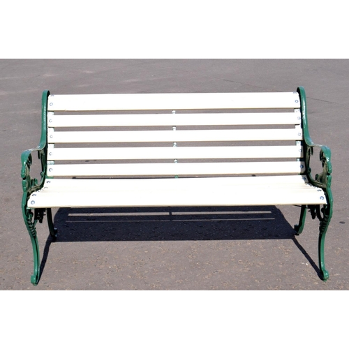 535 - Green recently restored slatted garden bench with nice lion head design