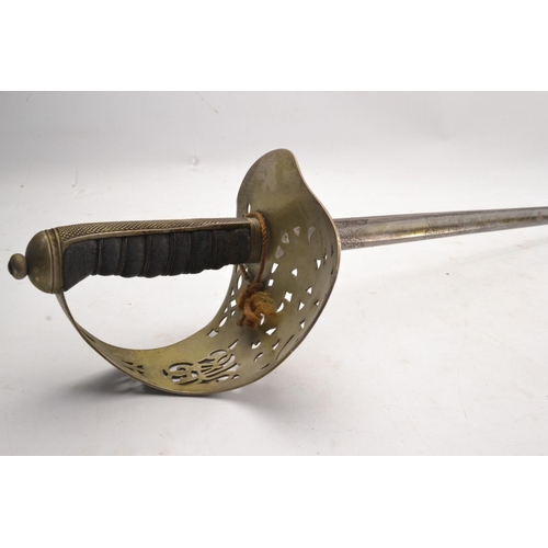 125 - Original Officers cavalry cutlass sword highly decorated and inscribed with R McQueen Newcastle Upon... 