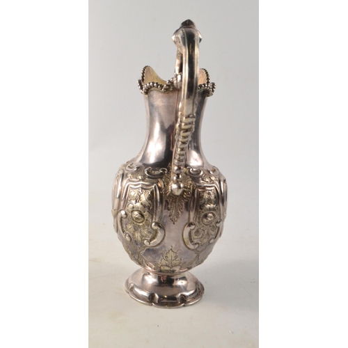 137 - 19th C Glasgow silver ewer, with scrolling and floral decoration, gilt lined interior