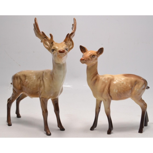 181 - A BESWICK DEER FAMILY to include a Buck, Doe and 2 fawns