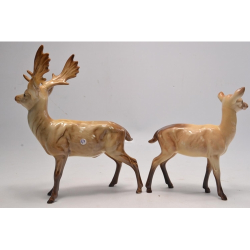 181 - A BESWICK DEER FAMILY to include a Buck, Doe and 2 fawns