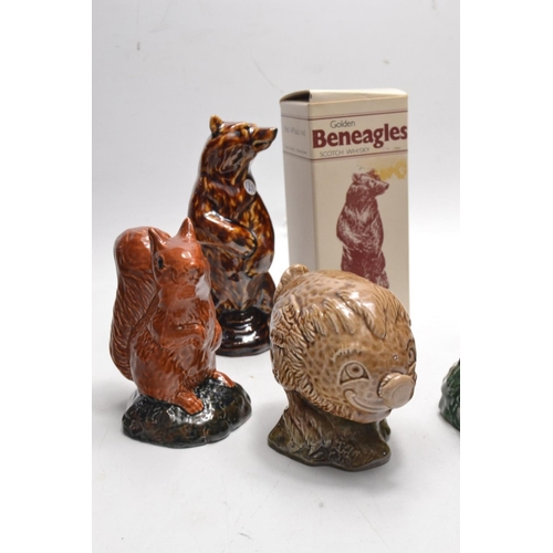 187 - A selection of BESWICK BENEAGLES decanters. To include a haggis, badger, sea, grizzly beal and squir... 