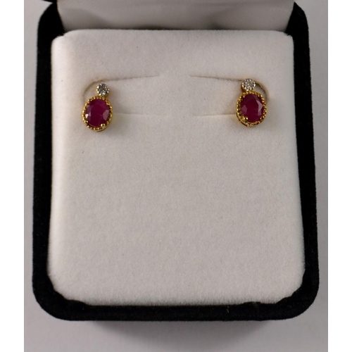 19 - 9k yellow gold Burmese Ruby and Diamond earrings. Gem weight is 0.71 carats, approx. With authentici... 