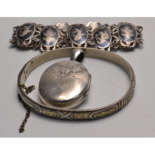 22 - A vintage silver locket, bangle and a bracelet