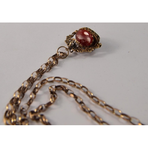 23 - Late 19th century 9ct gold chain and trio of stones to include a birth stone, jet stone etc