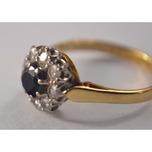 33 - A STUNNING vintage 18ct gold and sapphire diamond floral cluster dress ring, size M, (3.5grm) with a... 