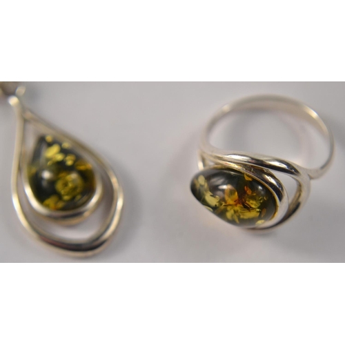 34A - Silver stamped 925 Green amber ring, size N/O and a pendant