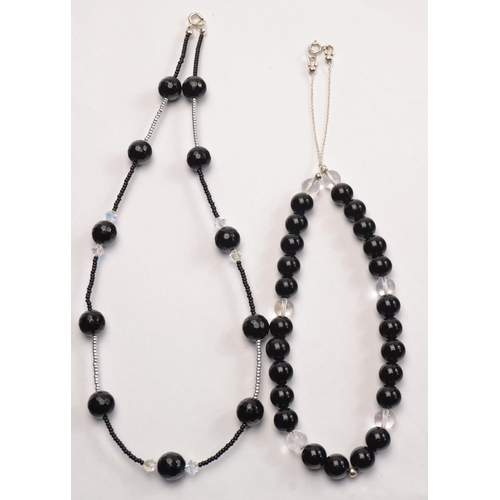 38 - 2 necklaces, Black agate and clear quartz necklace, and and the other SWAROVSKI crystal and black ag... 