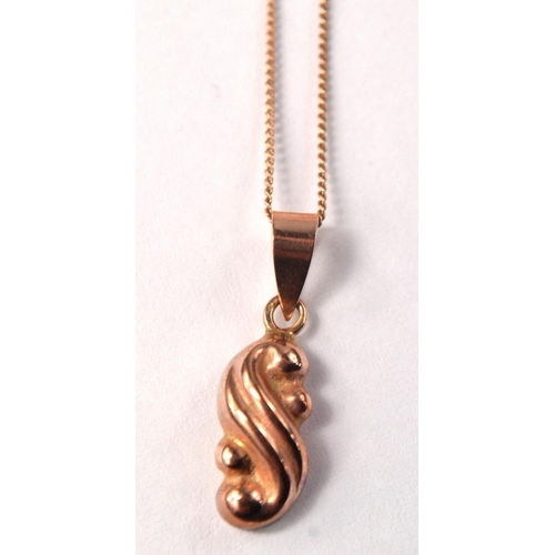 4 - 9ct rose gold pendant on 9ct rose gold fine link chain.