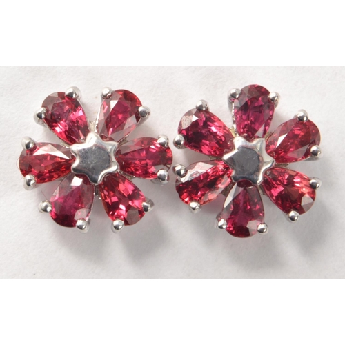 44 - Floral 9k white gold ruby stud earrings