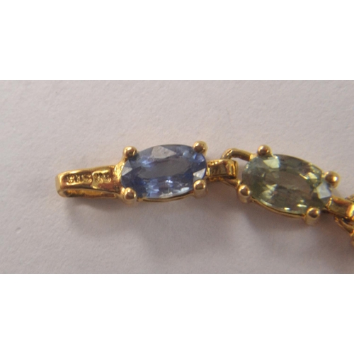 49 - STUNNING 375 yellow gold marked bracelet with multi coloured sapphire  stones. Comes with authentici... 