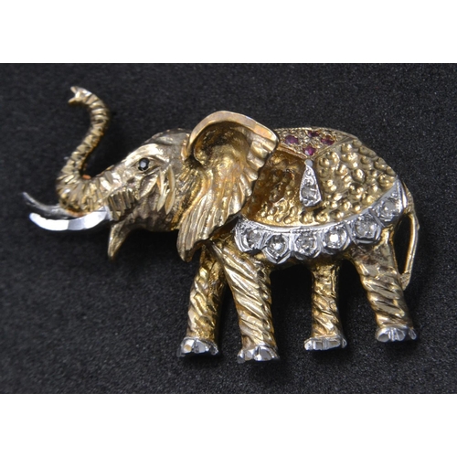 58 - 9ct gold elephant design brooch set with diamonds and rubies