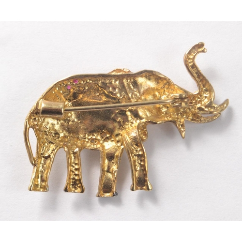 58 - 9ct gold elephant design brooch set with diamonds and rubies