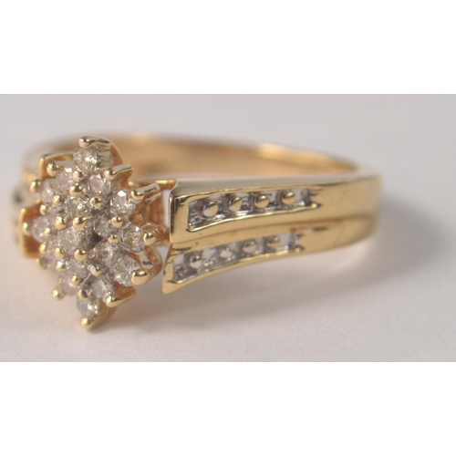 62 - 10ct diamond cluster ring with diamond set shoulder. Size N/O