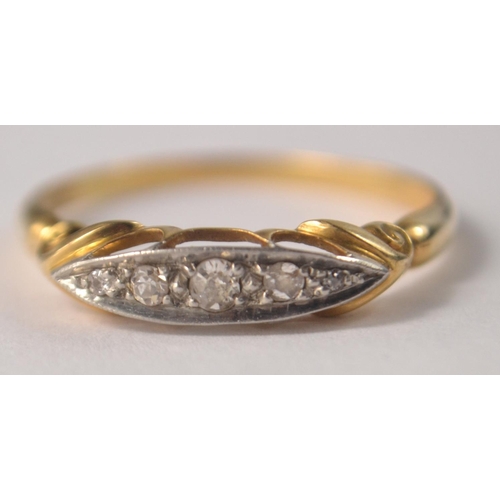 67 - Edwardian 18ct 5 diamond set ring with scrolling design. Size W