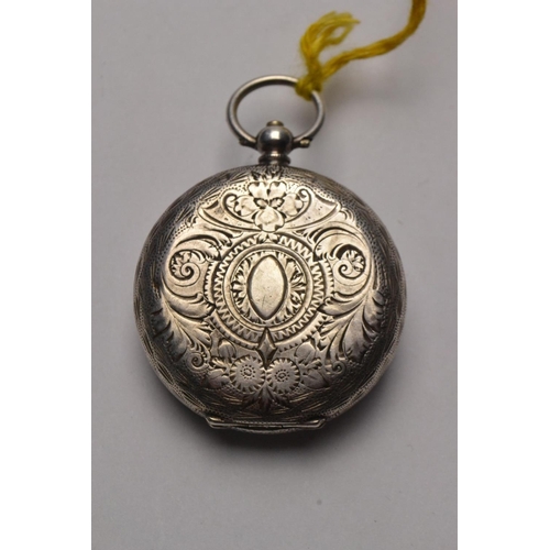 73 - 935 Silver cased pocket watch with key, roman number dial and rope twist gilt design. Dial 4cm