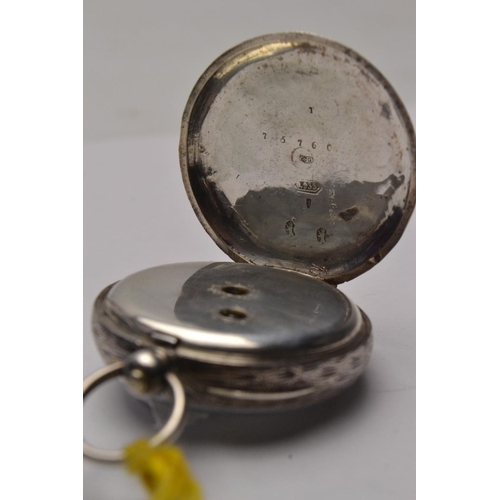 73 - 935 Silver cased pocket watch with key, roman number dial and rope twist gilt design. Dial 4cm