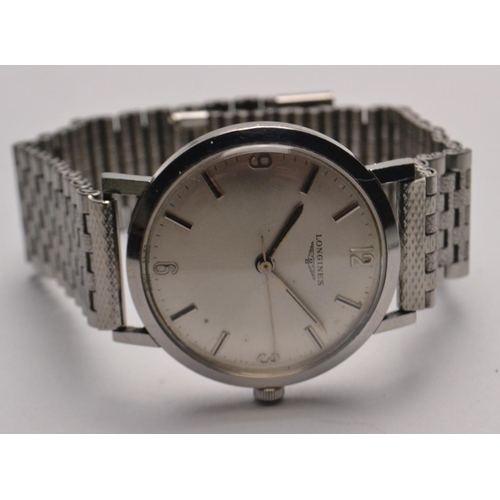 74 - LONGINES stainless steel gents wristwatch. Dial 4cm across