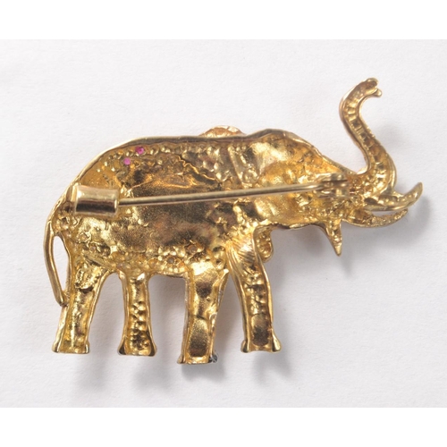 38 - 9ct gold elephant design brooch set with diamonds and rubies