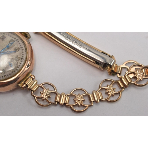 63 - 9ct gold cased wristwatch