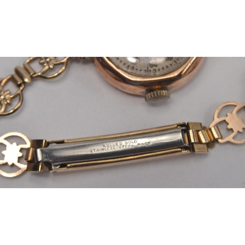 63 - 9ct gold cased wristwatch