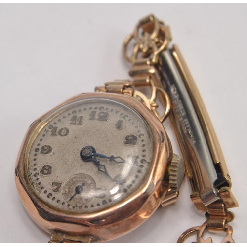 63 - 9ct gold cased wristwatch