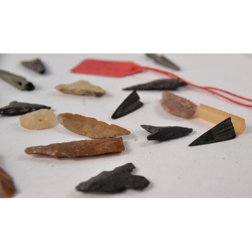 78 - Selection of metal and stone arrowheads, possibly African. Some with information tags of Greek origi... 