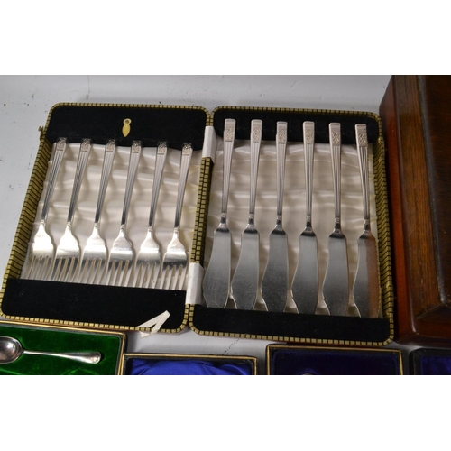 144 - Various boxed flatware include fish knives and forks etc