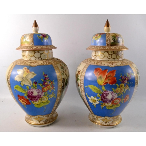 173 - Pair of Victorian scene temple jars and covers with beige and blue ground and gilt highlight. With f... 