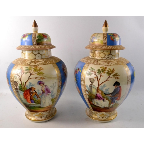 173 - Pair of Victorian scene temple jars and covers with beige and blue ground and gilt highlight. With f... 